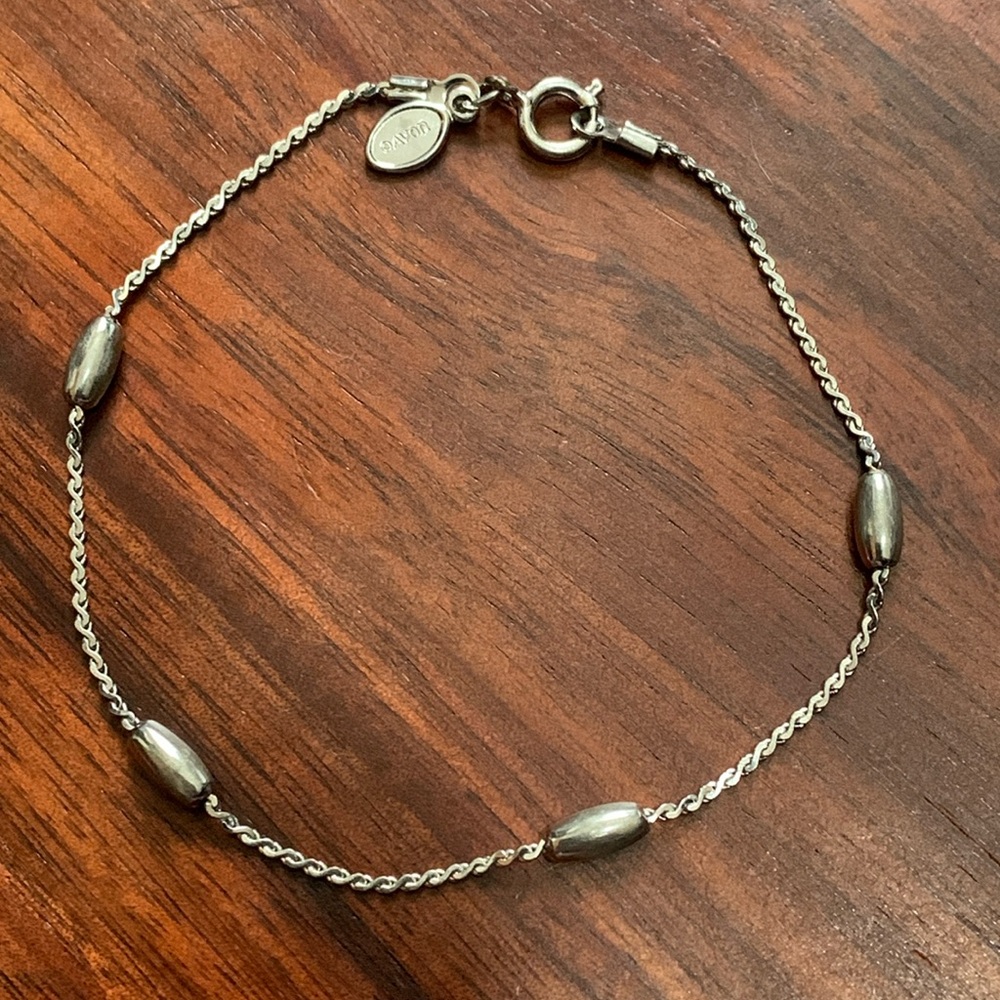 Avon silver tone bracelet